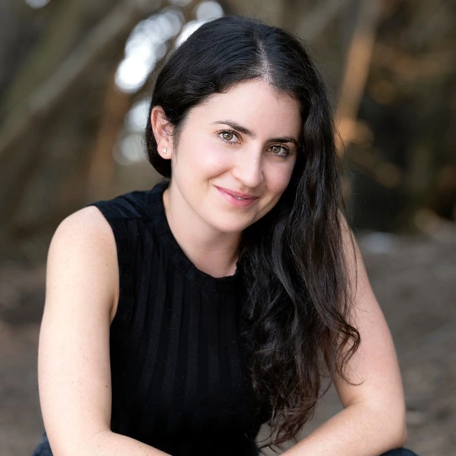 Portrait photo of Morgan Beller smiling outdoors